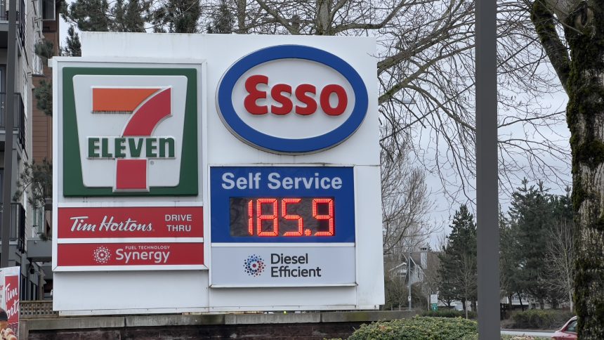 Esso gas station sign showing gasoline price at 185.9 cents per litre at a 7-Eleven location in Langley, British Columbia.