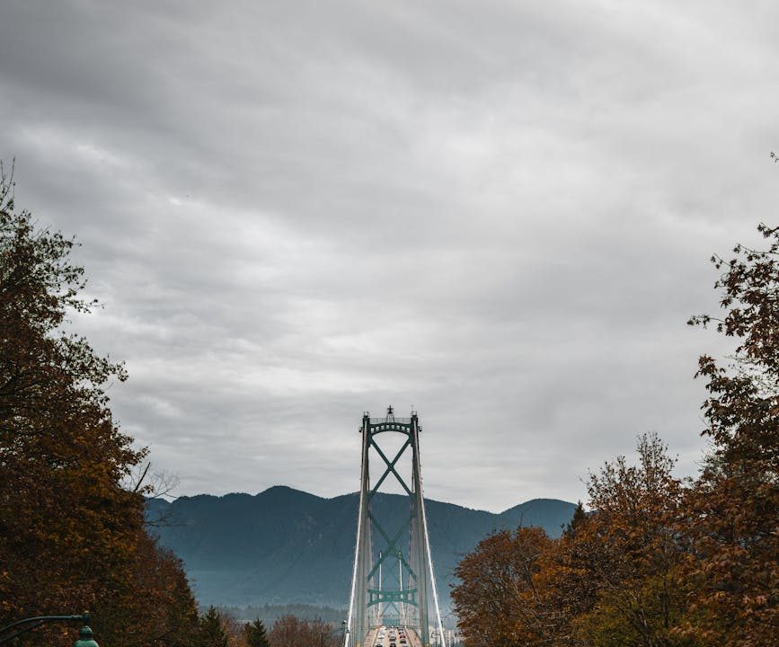 lions gate bridge in vancouver bc during fall